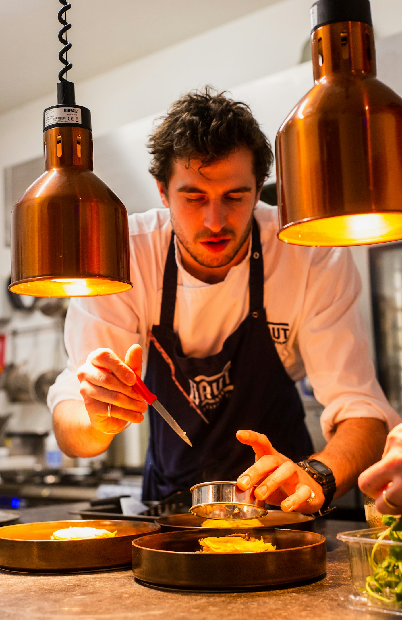 Chef Tom Lockhart in the Knife & Flame kitchen
