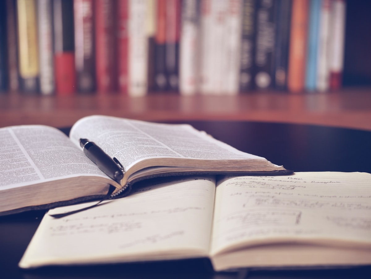 A study desk with books and warm afternoon light